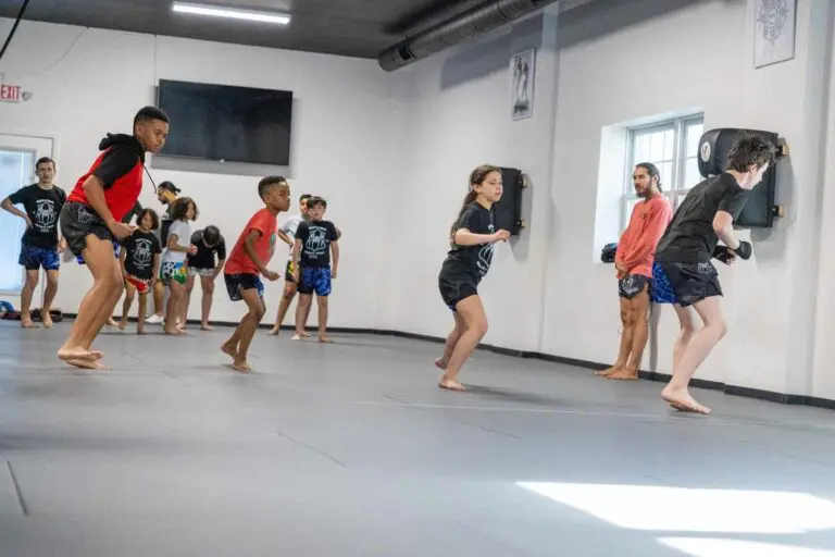 Children practicing martial arts drills in a supervised class, demonstrating kids martial arts safety in Garwood, NJ.